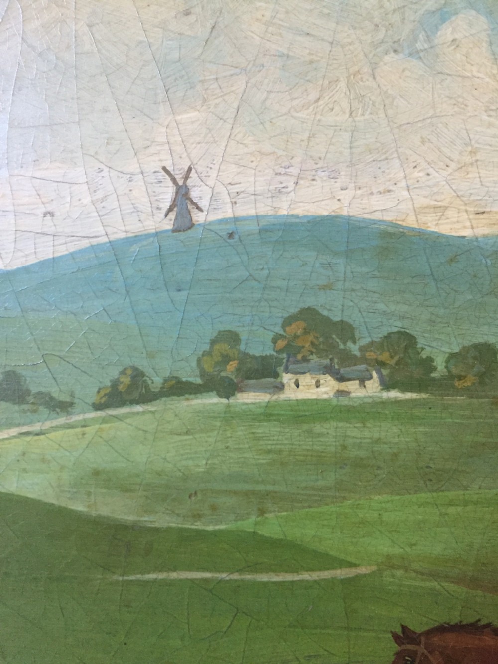 An early 19th-century rectangular papier-mache tray featuring a gilded scrollwork border and a central hand-painted scene of horsemen and hounds engaged in a fox hunt across a countryside landscape. View XI