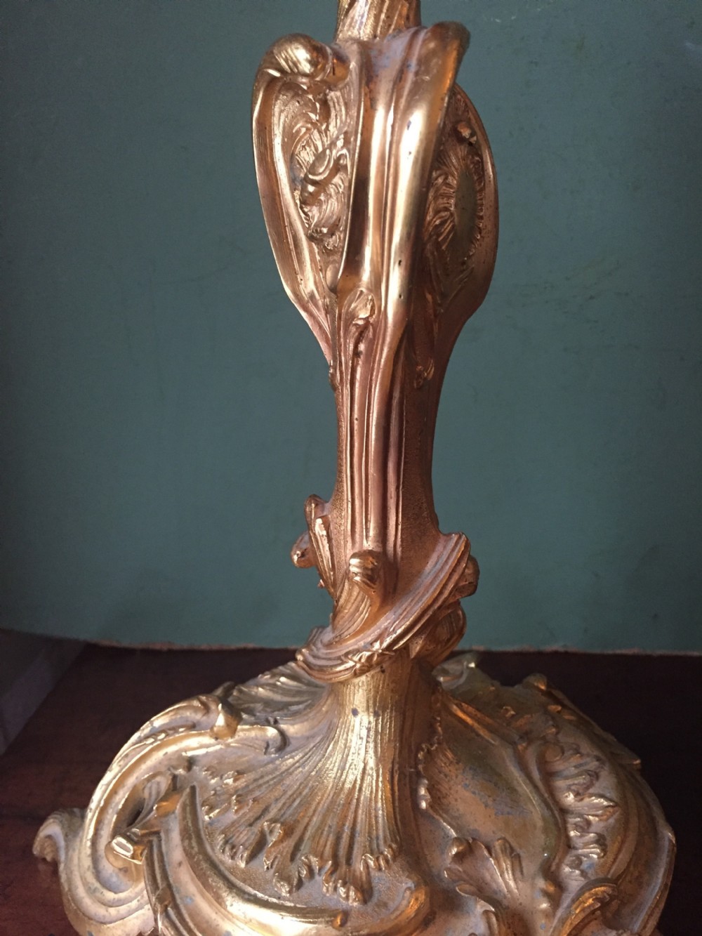 Pair of mid C19th French ormolu bronze candlesticks of Louis XVI rococo design. View XVI