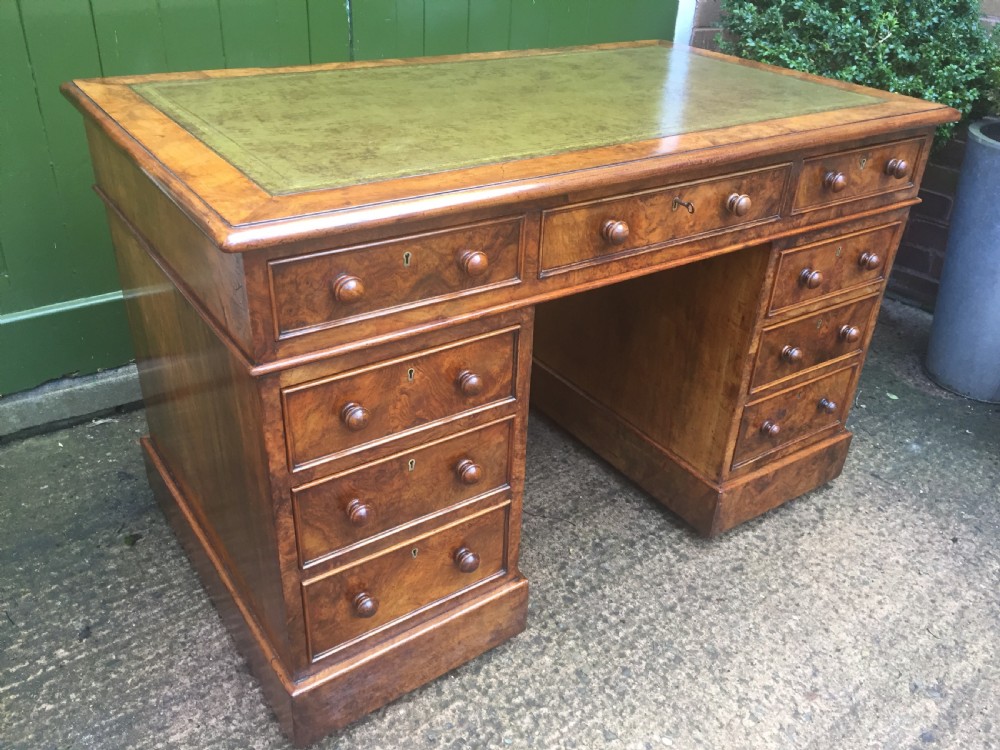 Exceptional quality mid-C19th Victorian burr-walnut pedestal desk of practical proportions. View IV