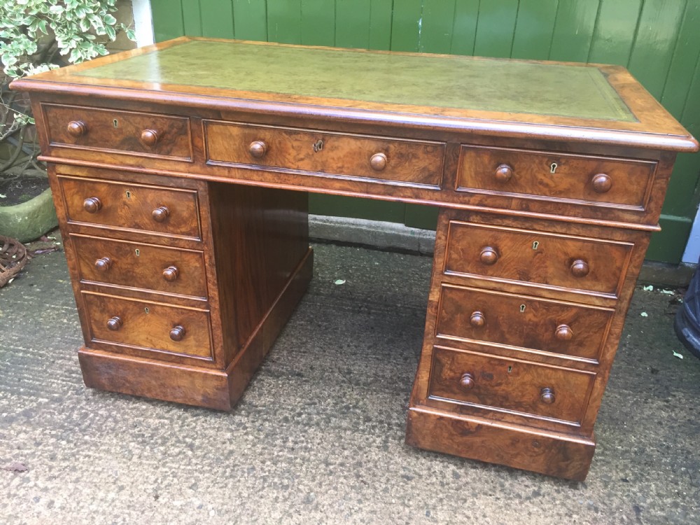 Exceptional quality mid-C19th Victorian burr-walnut pedestal desk of practical proportions. View V