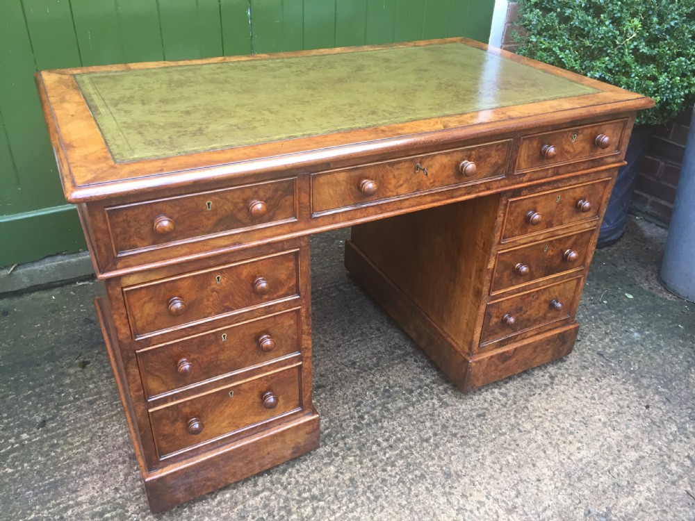 Exceptional quality mid-C19th Victorian burr-walnut pedestal desk of practical proportions. View VI