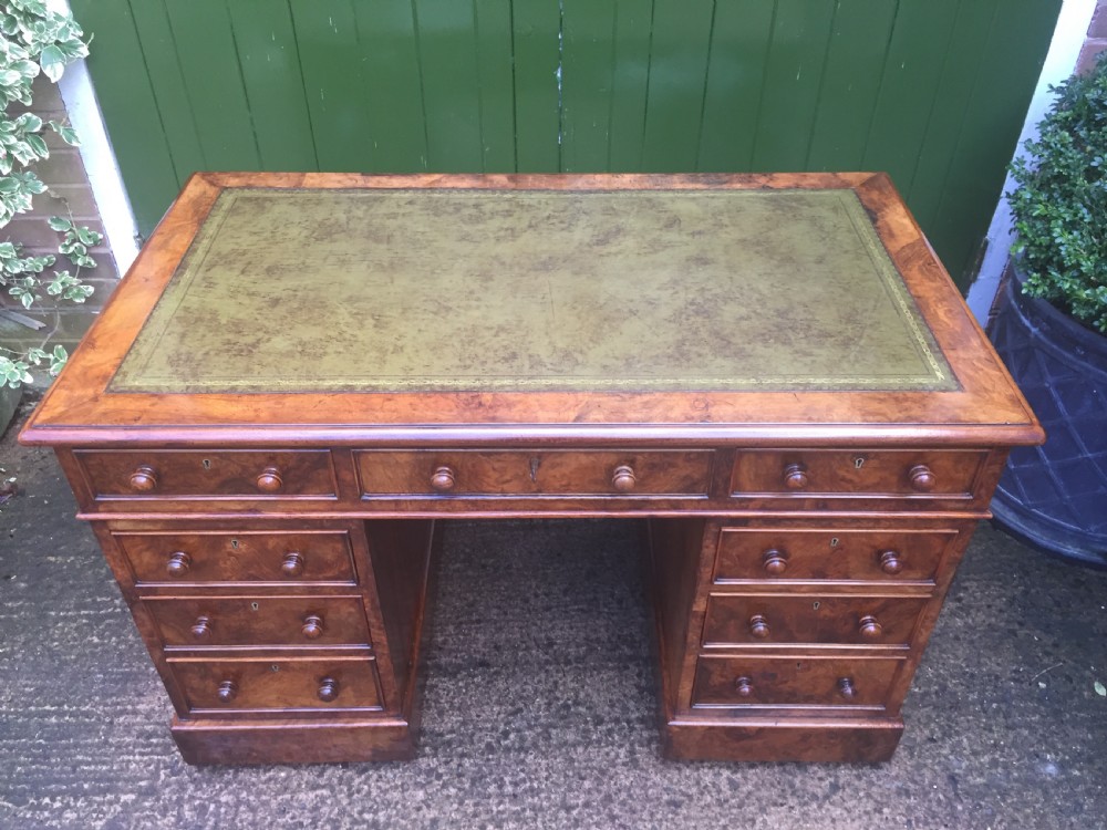 Exceptional quality mid-C19th Victorian burr-walnut pedestal desk of practical proportions. View VII