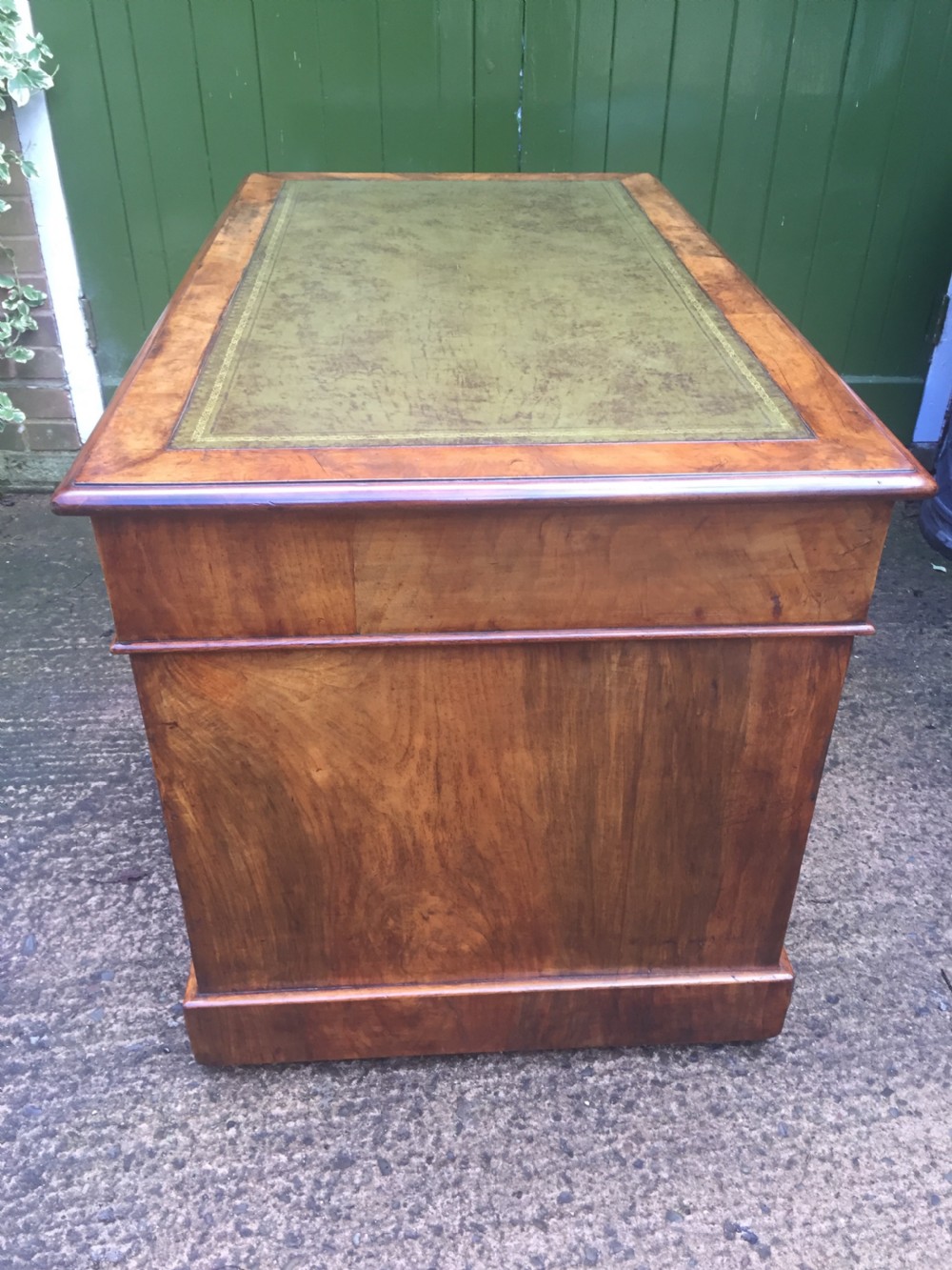 Exceptional quality mid-C19th Victorian burr-walnut pedestal desk of practical proportions. View VIII
