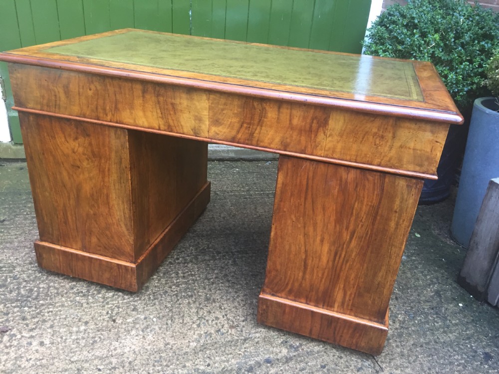 Exceptional quality mid-C19th Victorian burr-walnut pedestal desk of practical proportions. View X