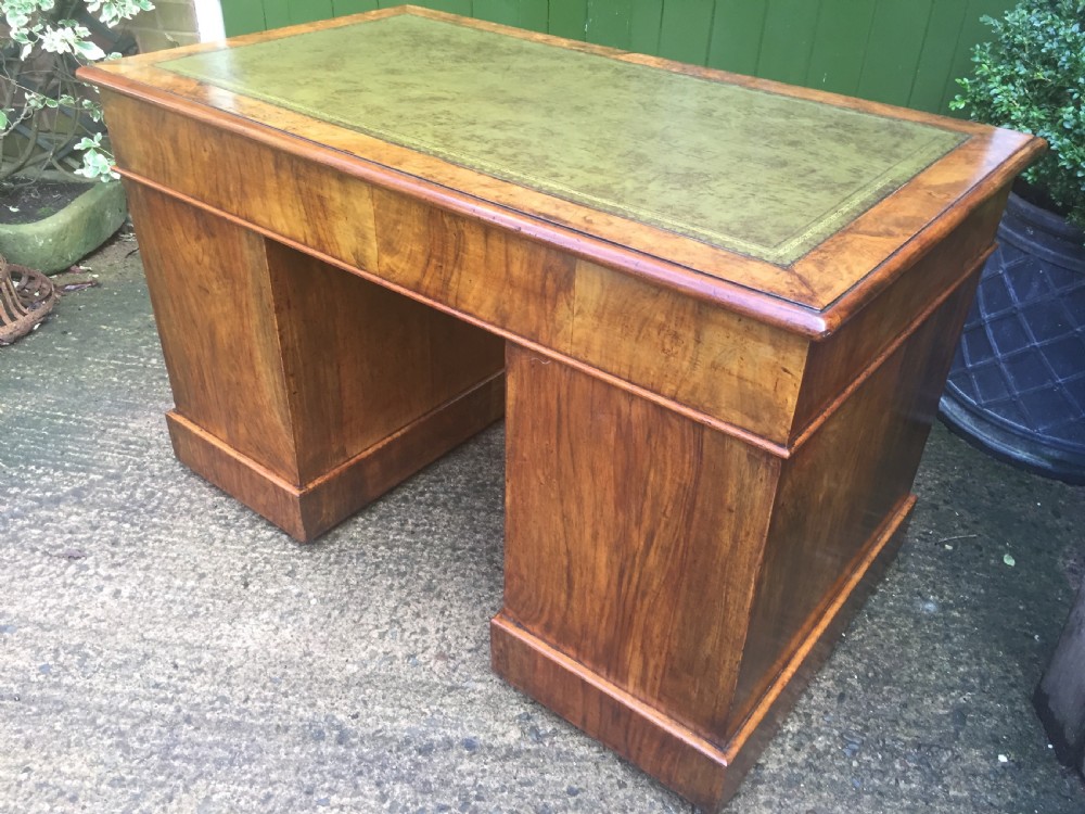 Exceptional quality mid-C19th Victorian burr-walnut pedestal desk of practical proportions. View XI