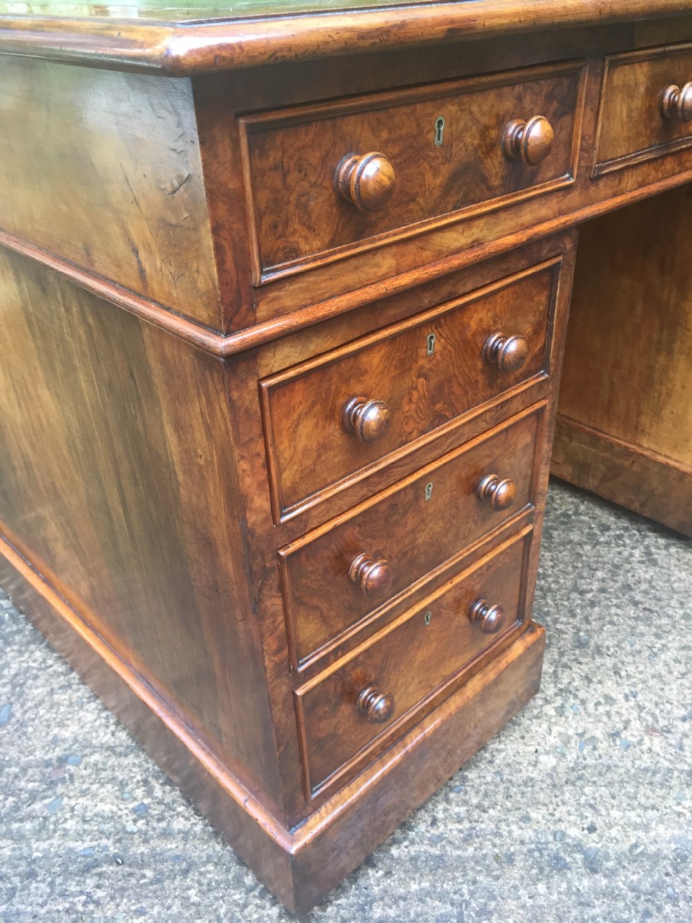 Exceptional quality mid-C19th Victorian burr-walnut pedestal desk of practical proportions. View XIII