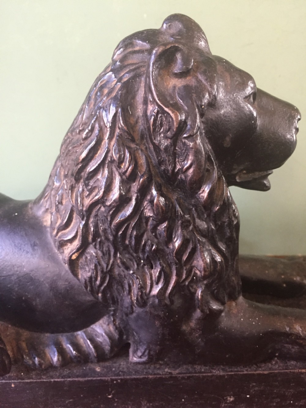 Late C19th cast-iron model of a recumbent lion on a rectangular plinth base. View VII
