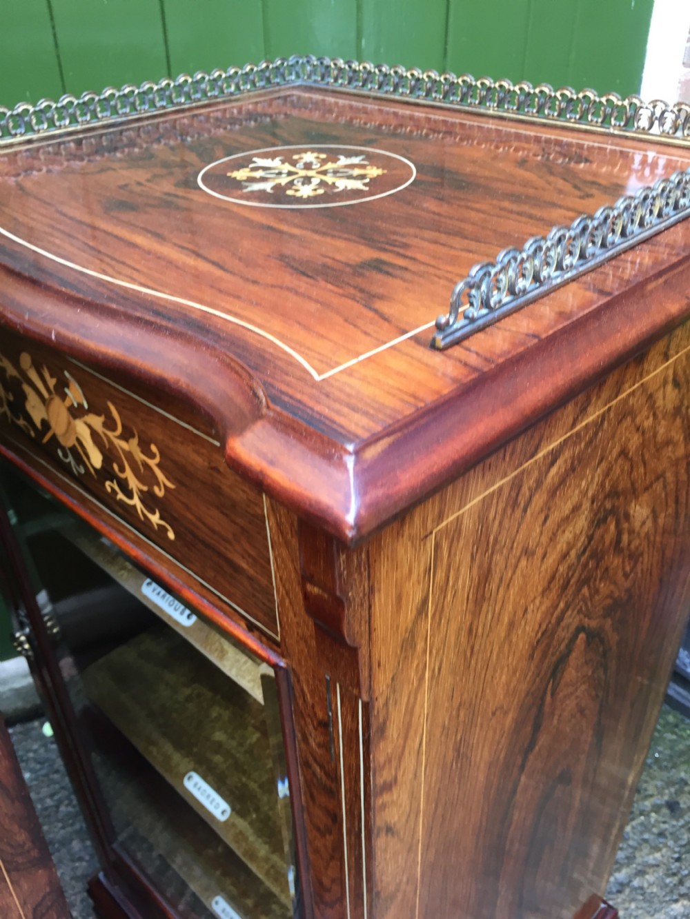 Matching pair of high-quality Edwardian period inlaid figured rosewood music cabinets. View X