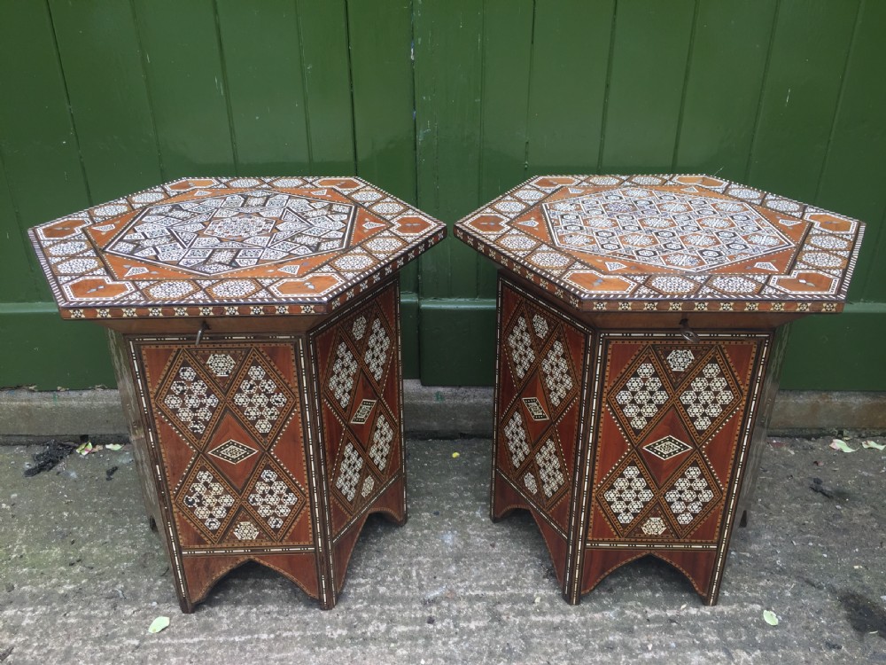 Pair of late C19th Syrian inlaid octagonal tables with rising tops .