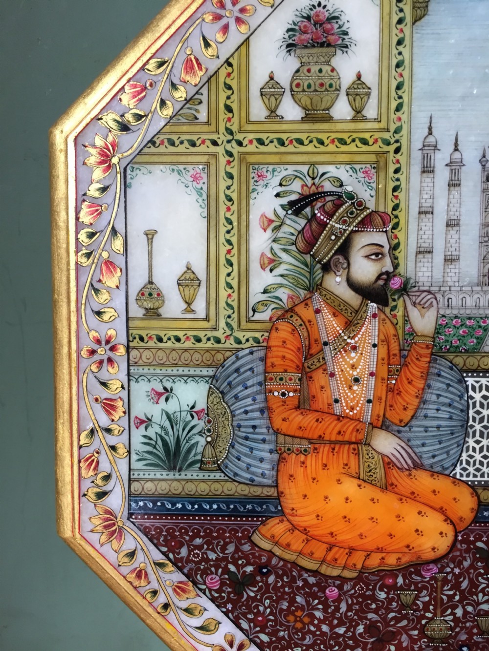 Finely painted early C20th Indian octagonal marble panel depicting Shah Jahan and Mumtaz Mahal , posed on a carpet before the Taj Mahal in Agra. View III
