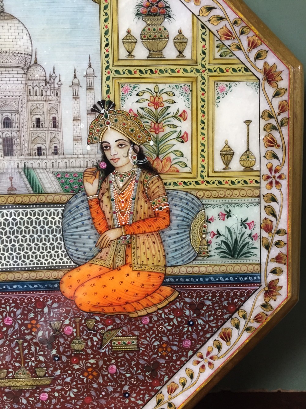 Finely painted early C20th Indian octagonal marble panel depicting Shah Jahan and Mumtaz Mahal , posed on a carpet before the Taj Mahal in Agra. View IV