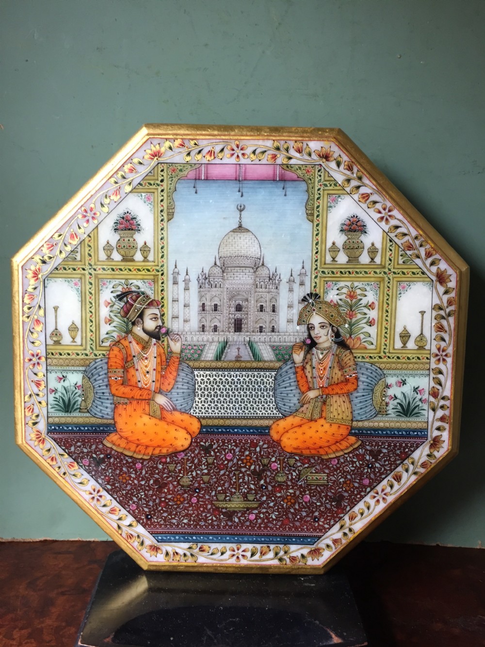 Finely painted early C20th Indian octagonal marble panel depicting Shah Jahan and Mumtaz Mahal , posed on a carpet before the Taj Mahal in Agra. View XXI