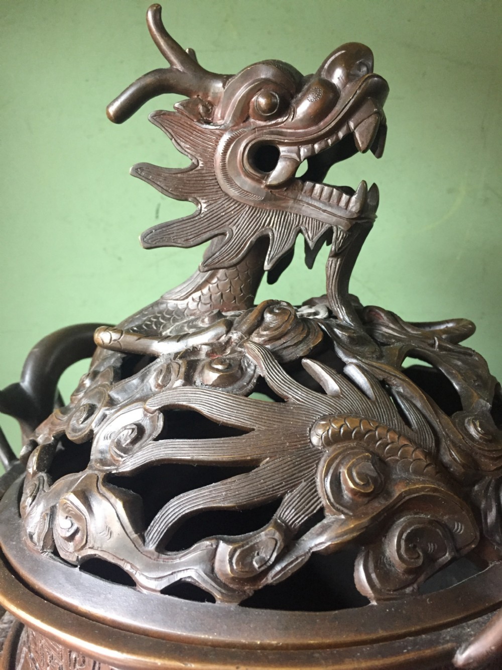 C19th Chinese Qing Dynasty cast bronze 'dragon' censer , or incense burner , and cover on original carved hardwood stand . View VII