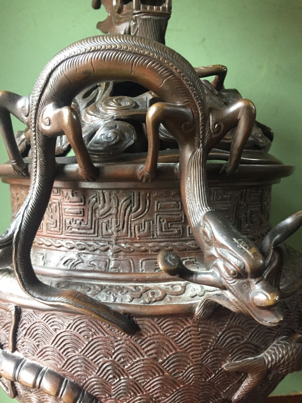 C19th Chinese Qing Dynasty cast bronze 'dragon' censer , or incense burner , and cover on original carved hardwood stand . View IX