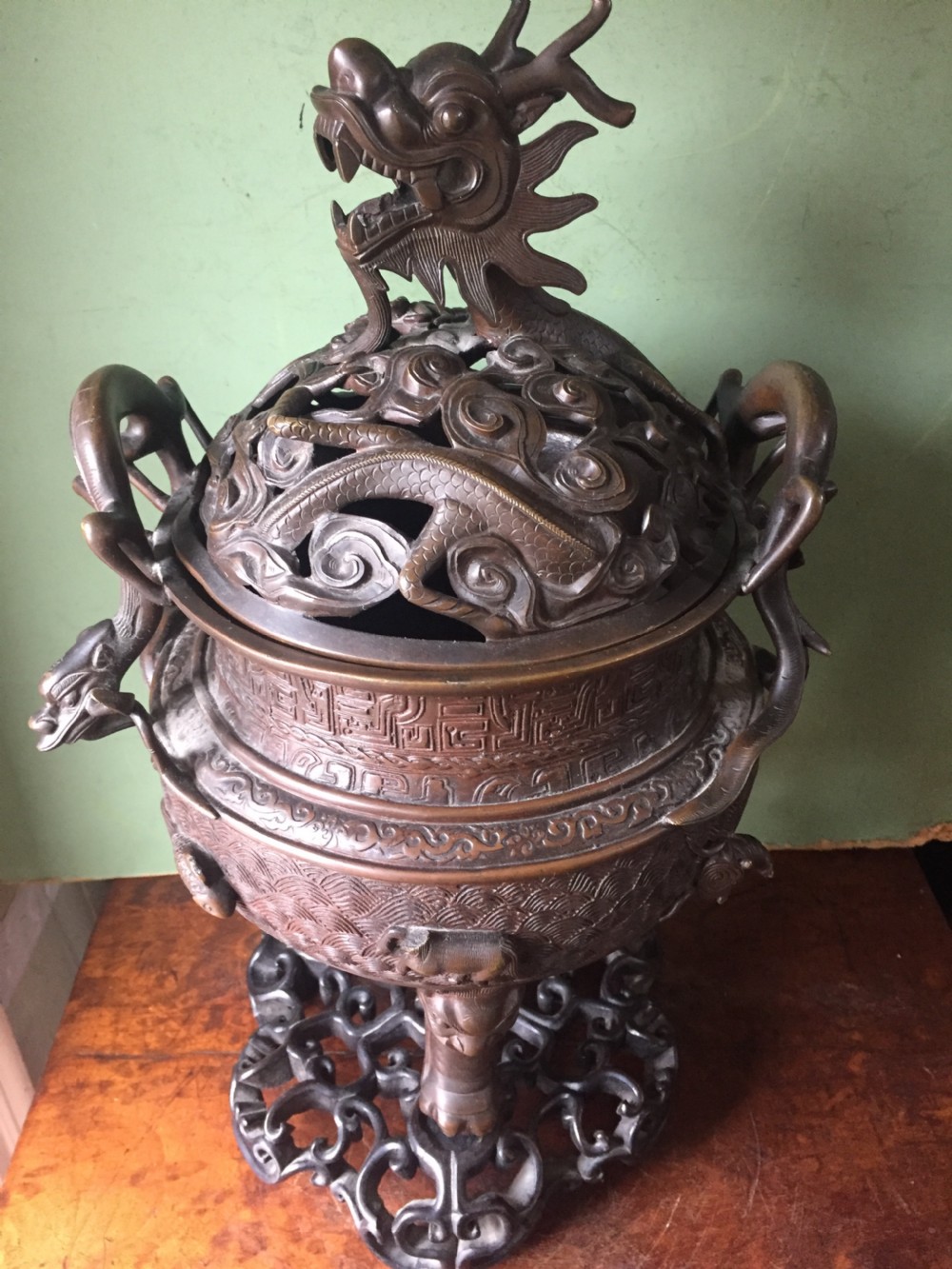 C19th Chinese Qing Dynasty cast bronze 'dragon' censer , or incense burner , and cover on original carved hardwood stand . View XII