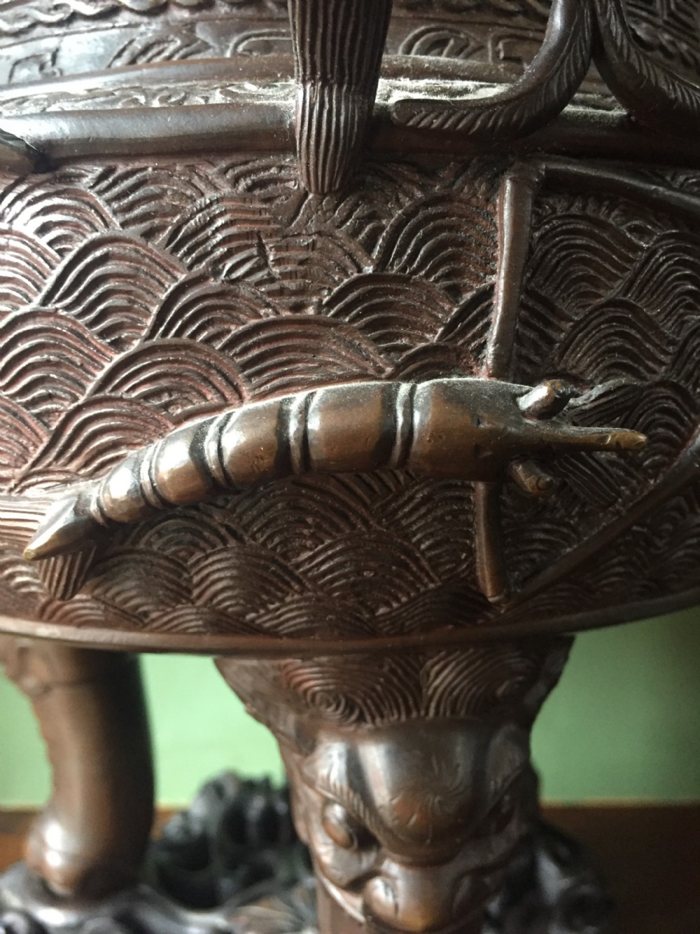 C19th Chinese Qing Dynasty cast bronze 'dragon' censer , or incense burner , and cover on original carved hardwood stand . View XVII
