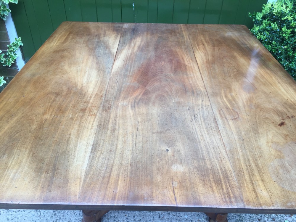 Early C19th George IV period faded mahogany rectangular breakfast or centre table of unusual proportions and design. View IV