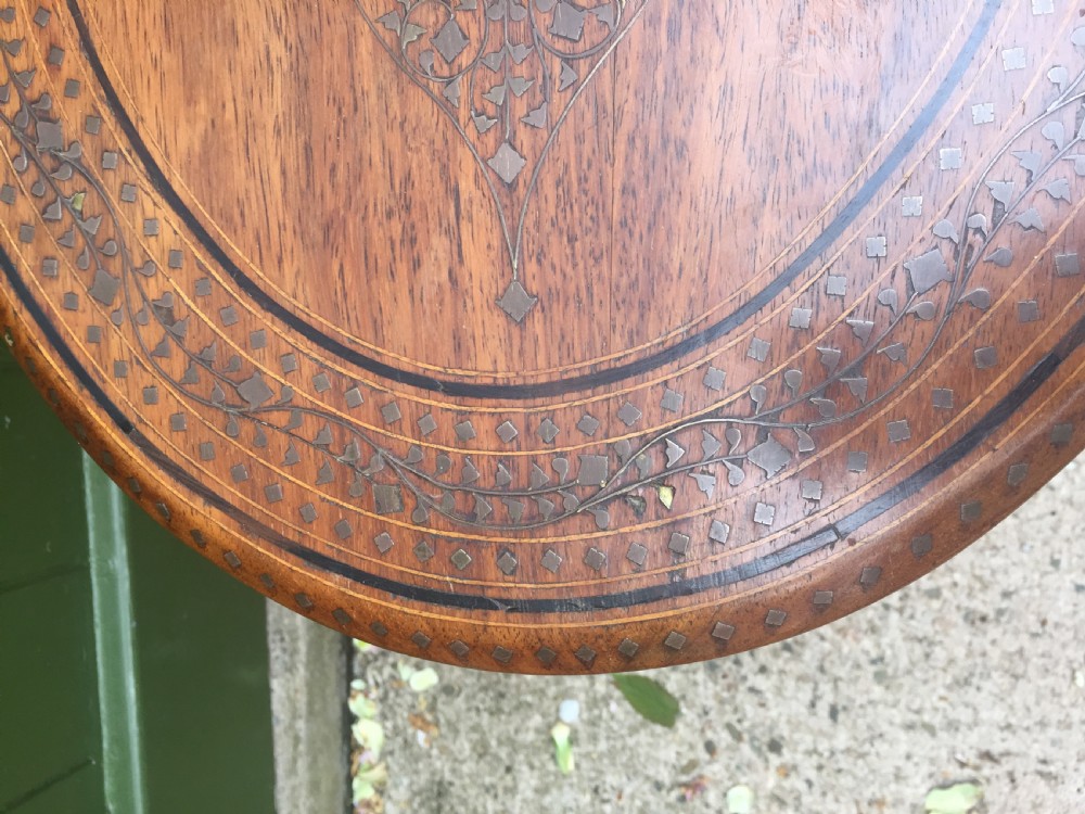 Late C19th Indian brass-inlaid oval teak occasional table on folding arcaded base. View IX