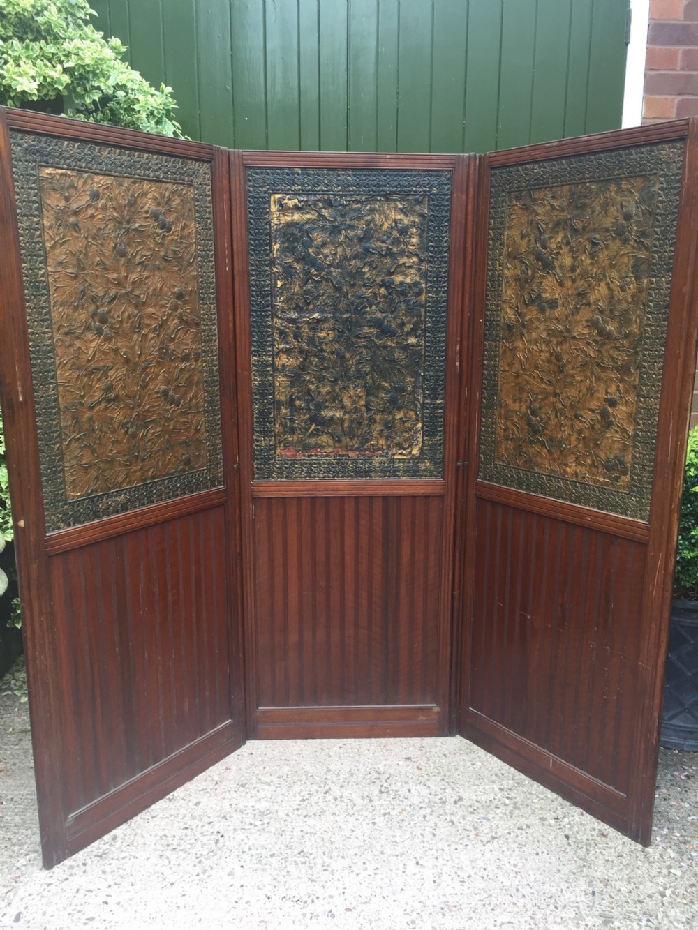 Late C19th mahogany and tooled leather 3-fold room-divider or screen .