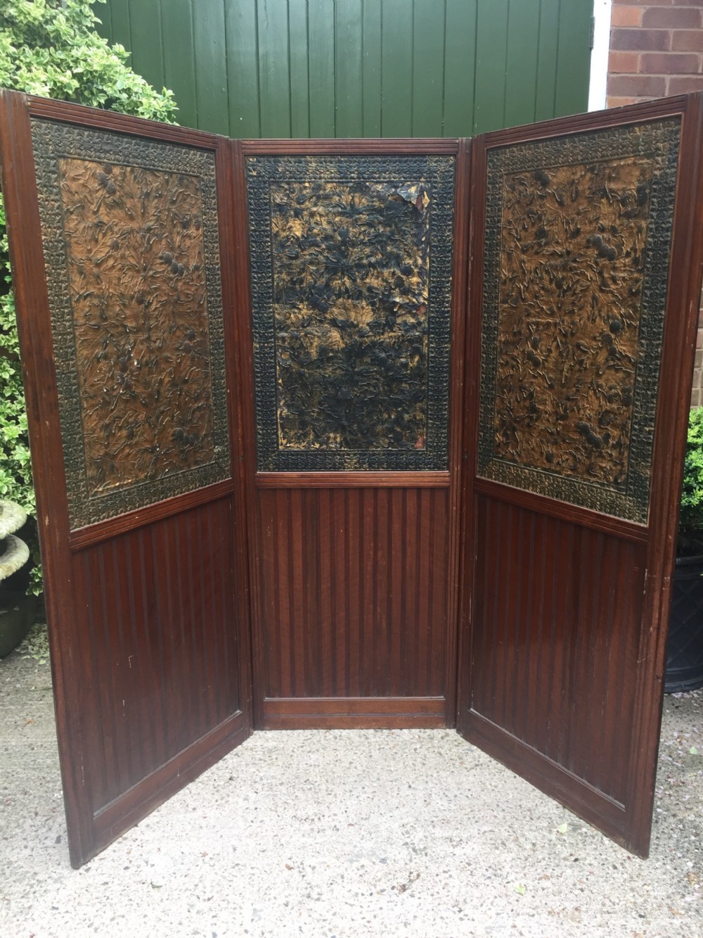 Late C19th mahogany and tooled leather 3-fold room-divider or screen . View VI