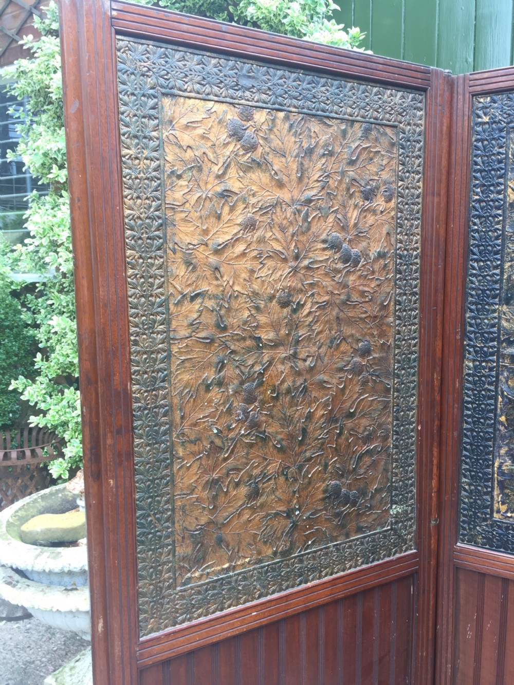 Late C19th mahogany and tooled leather 3-fold room-divider or screen . View VIII