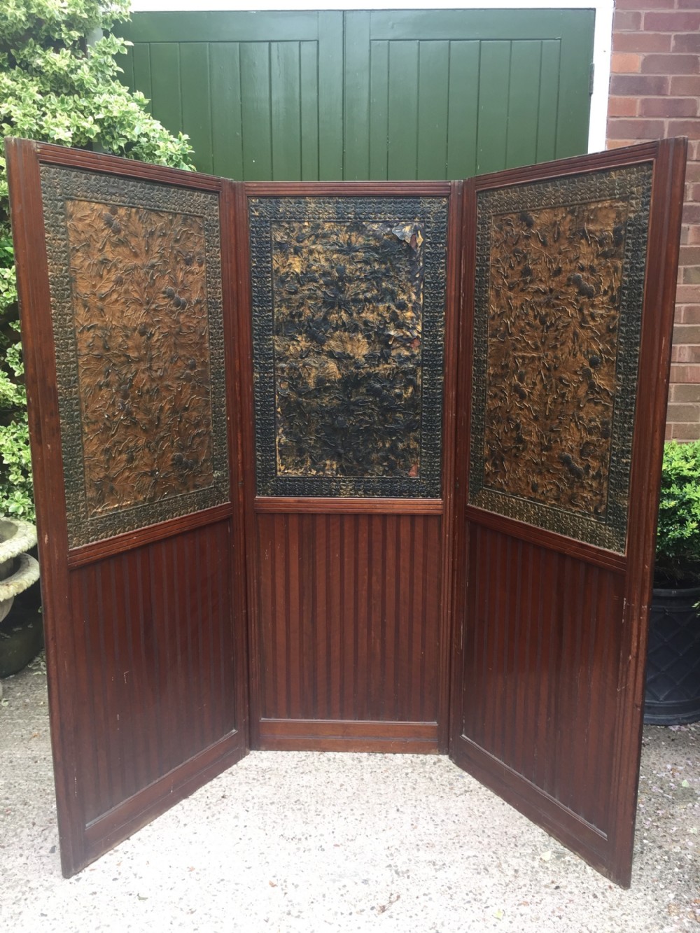 Late C19th mahogany and tooled leather 3-fold room-divider or screen . View IX