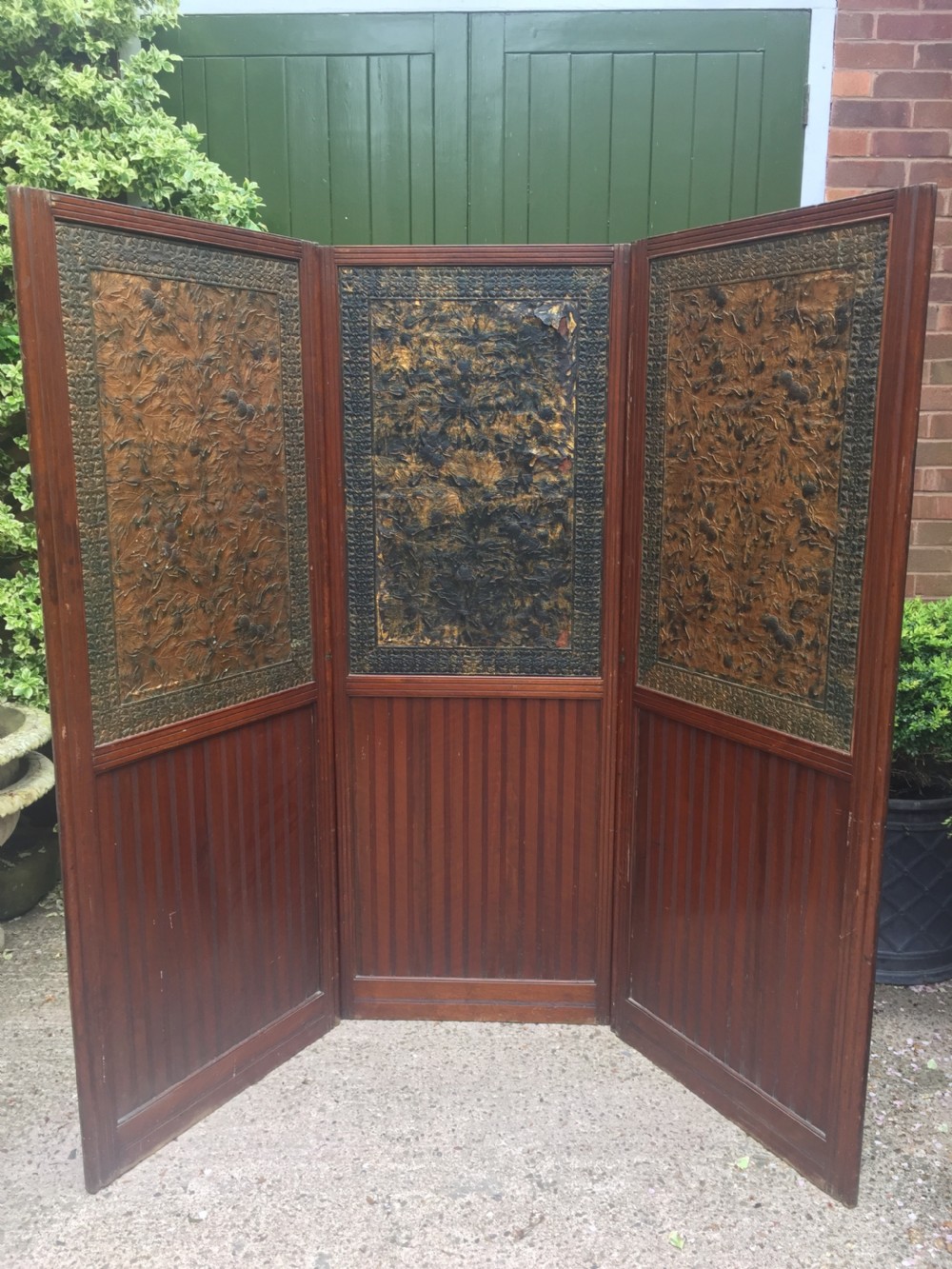 Late C19th mahogany and tooled leather 3-fold room-divider or screen . View XII