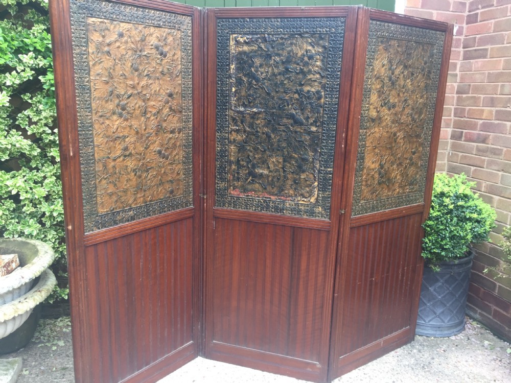 Late C19th mahogany and tooled leather 3-fold room-divider or screen . View XXI