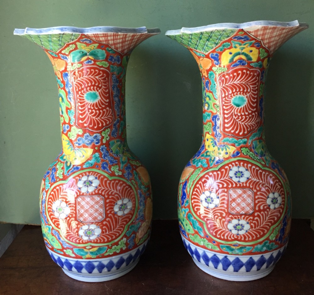 Pair of late C19th Japanese enamel decorated porcelain vases in stylised Imari palette, probably by Fukagawa factory of Tokyo.