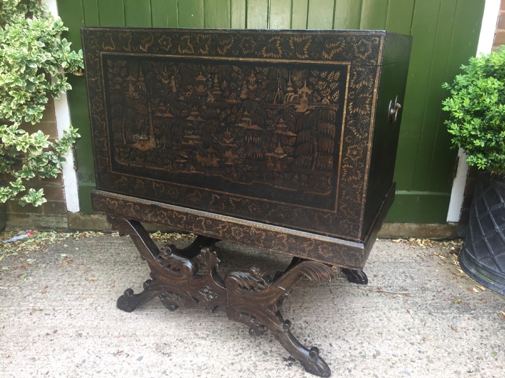 Rare and decorative mid C19th Indian painted and lacquered trunk on carved stand from Bareilly.