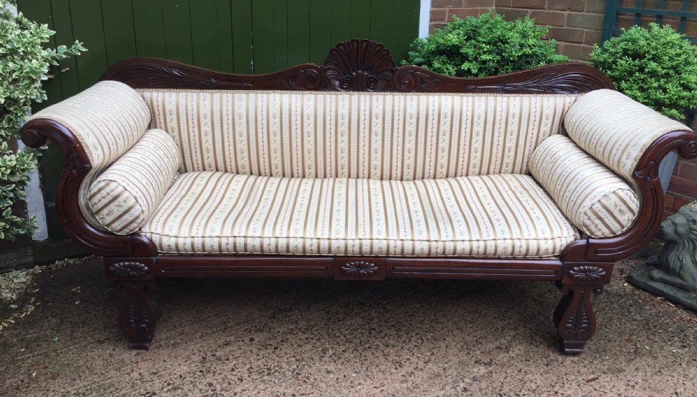 Early C19th Regency period mahogany scroll-end double-ended sofa of classically inspired design. View IV