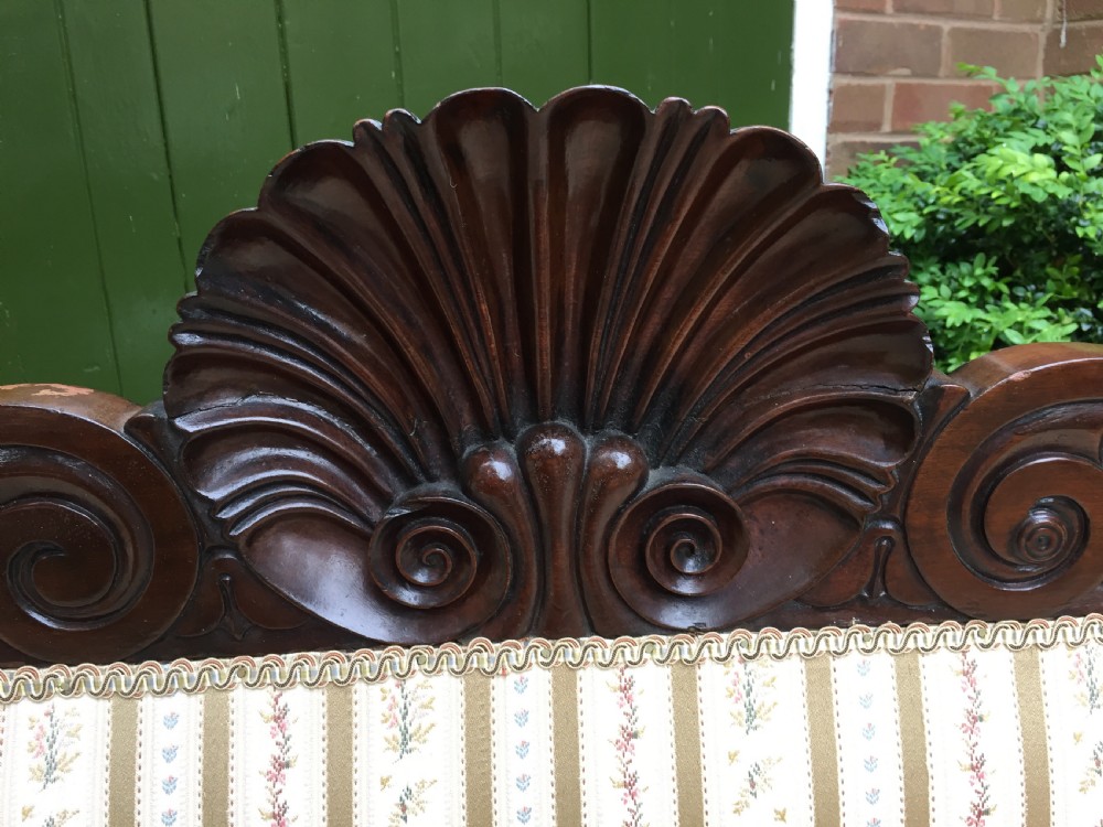 Early C19th Regency period mahogany scroll-end double-ended sofa of classically inspired design. View VII