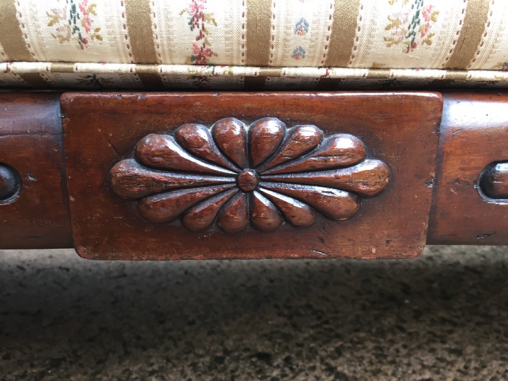 Early C19th Regency period mahogany scroll-end double-ended sofa of classically inspired design. View IX