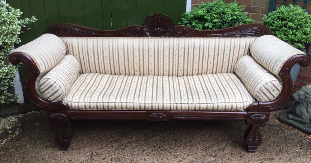 Early C19th Regency period mahogany scroll-end double-ended sofa of classically inspired design. View XVII