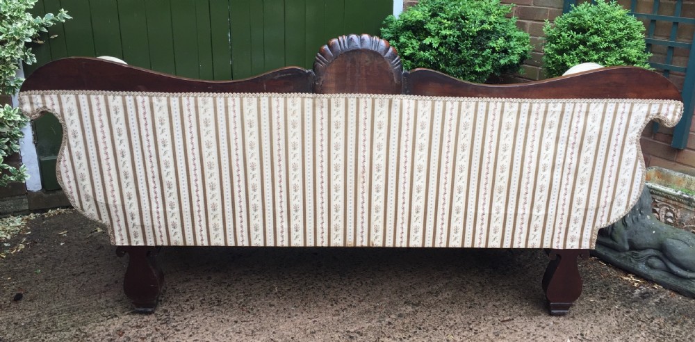 Early C19th Regency period mahogany scroll-end double-ended sofa of classically inspired design. View XX