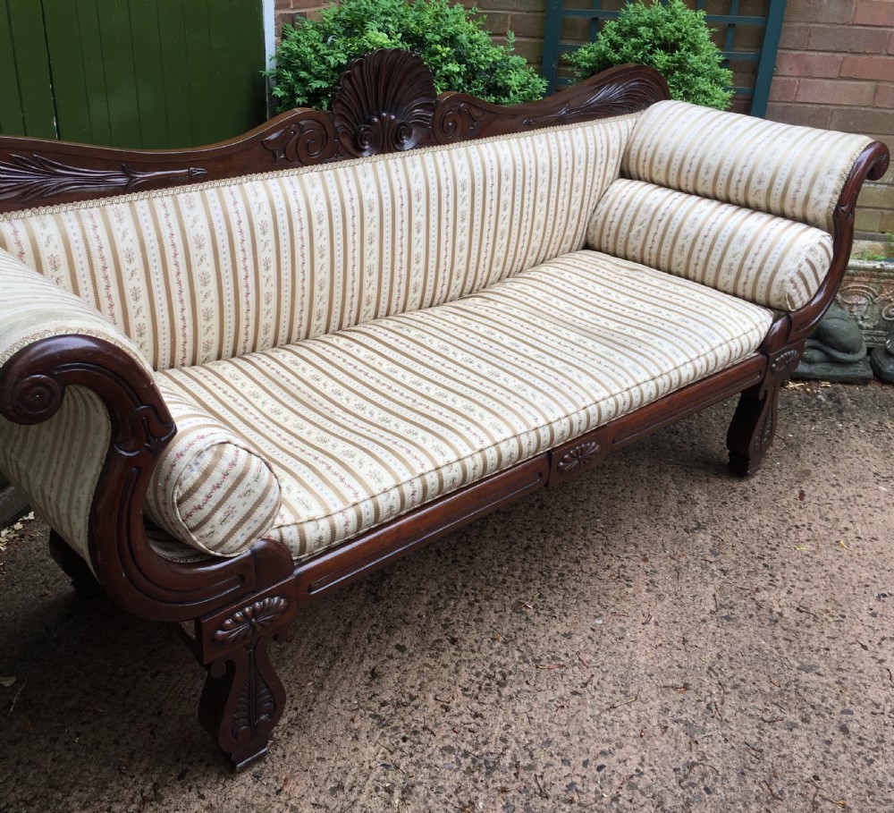 Early C19th Regency period mahogany scroll-end double-ended sofa of classically inspired design. View XV