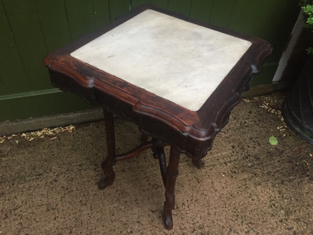 Late C19th Chinese Qing Dynasty carved hardwood square centre table with inset marble top. View VIII