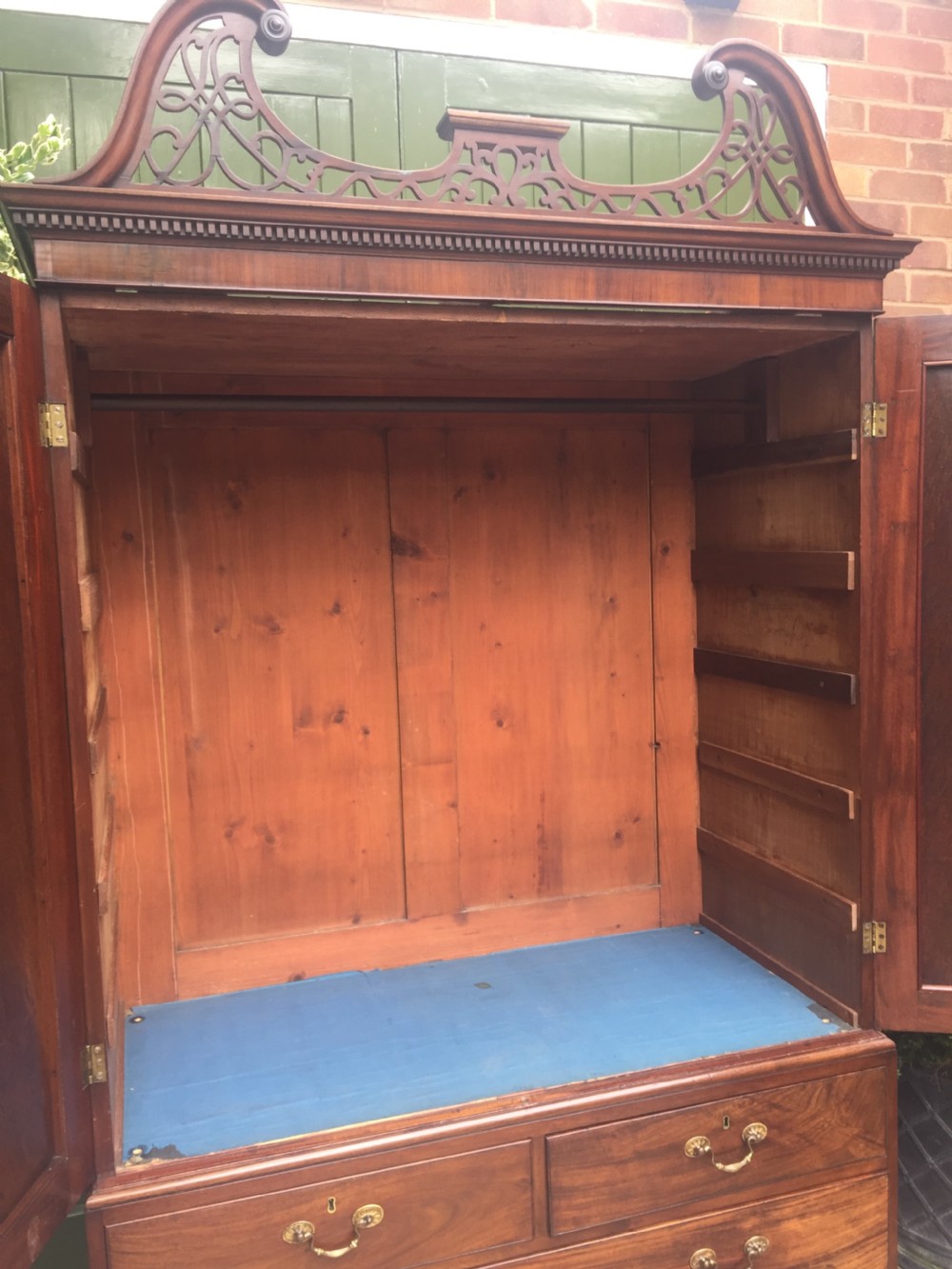 Rare George III Chippendale period and design padouk and mahogany linen-press or wardrobe with open fret-work 
