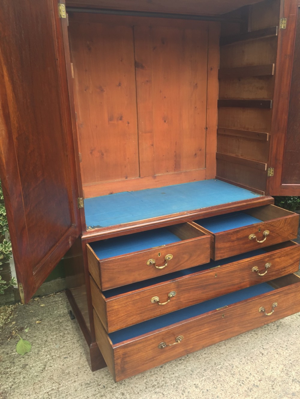 Rare George III Chippendale period and design padouk and mahogany linen-press or wardrobe with open fret-work 