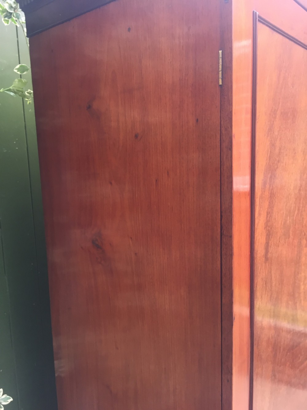 Rare George III Chippendale period and design padouk and mahogany linen-press or wardrobe with open fret-work 