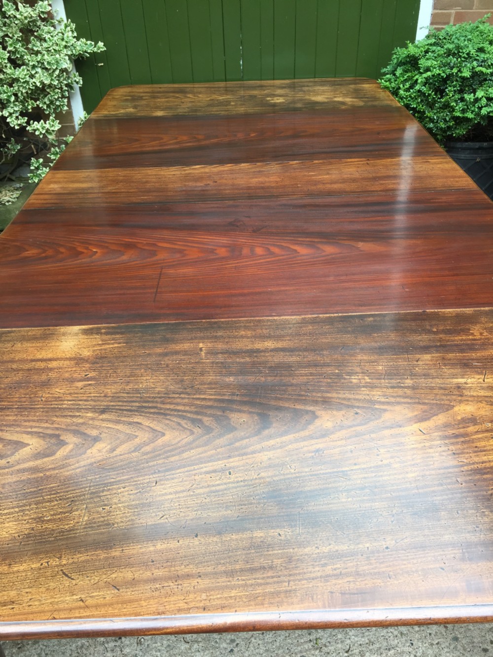 Early C19th Regency period mahogany extending dining table with 3 original additional leaves . View IX