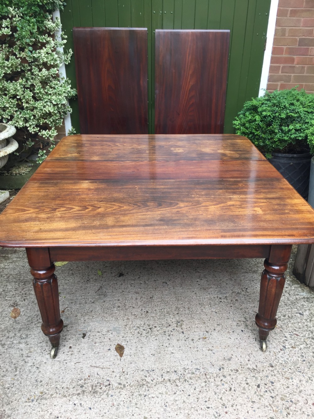 Early C19th Regency period mahogany extending dining table with 3 original additional leaves . View XV