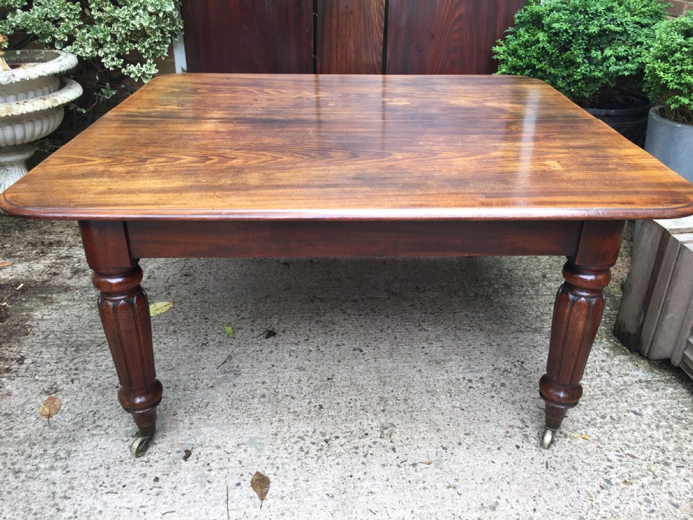 Early C19th Regency period mahogany extending dining table with 3 original additional leaves . View XVII