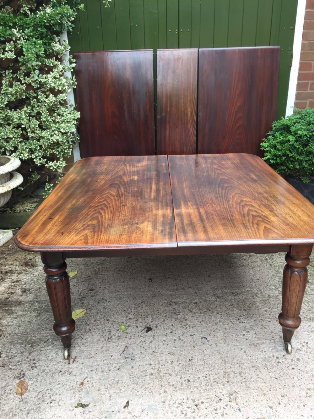 Early C19th Regency period mahogany extending dining table with 3 original additional leaves . View XXII