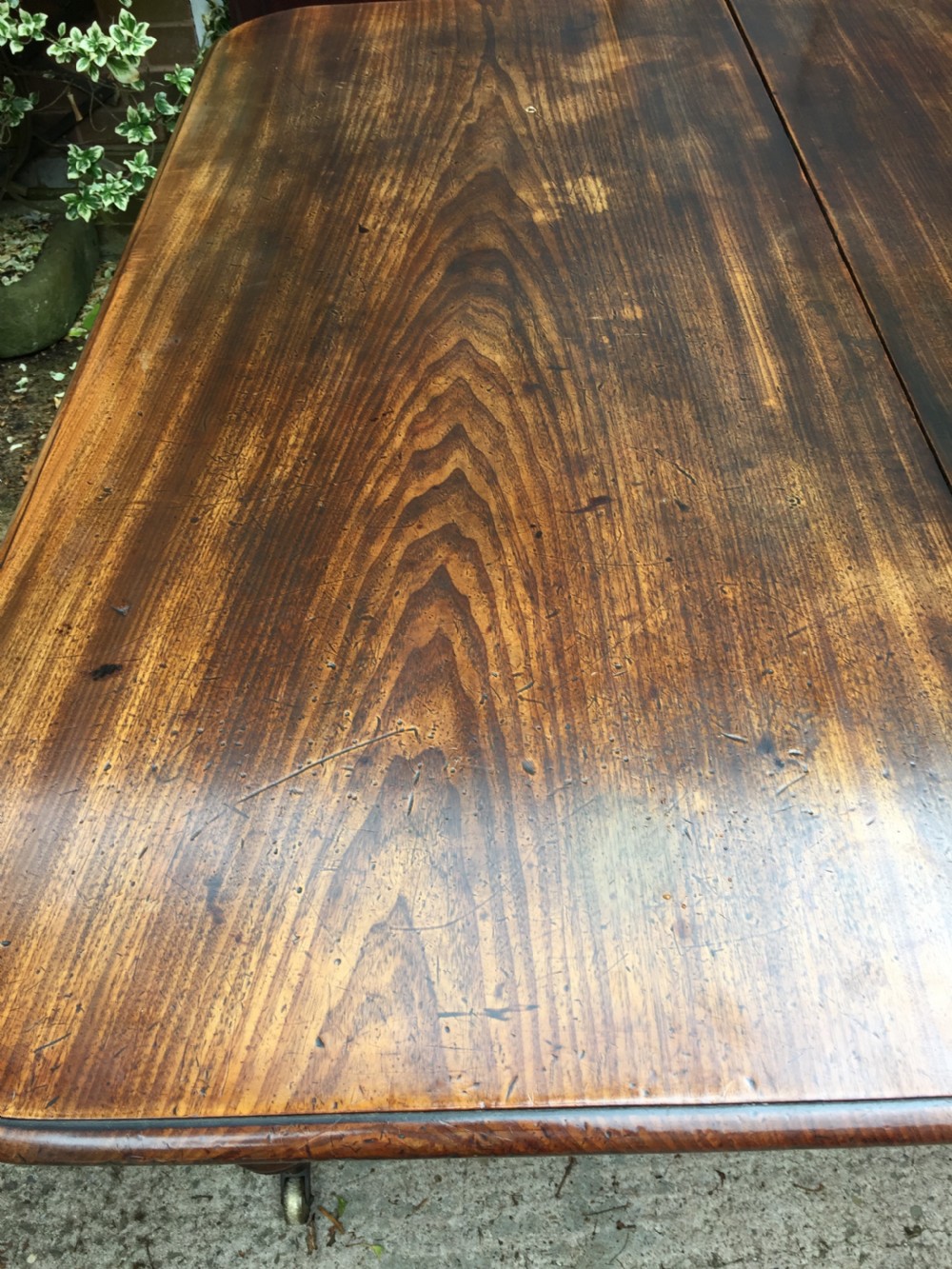 Early C19th Regency period mahogany extending dining table with 3 original additional leaves . View XXV
