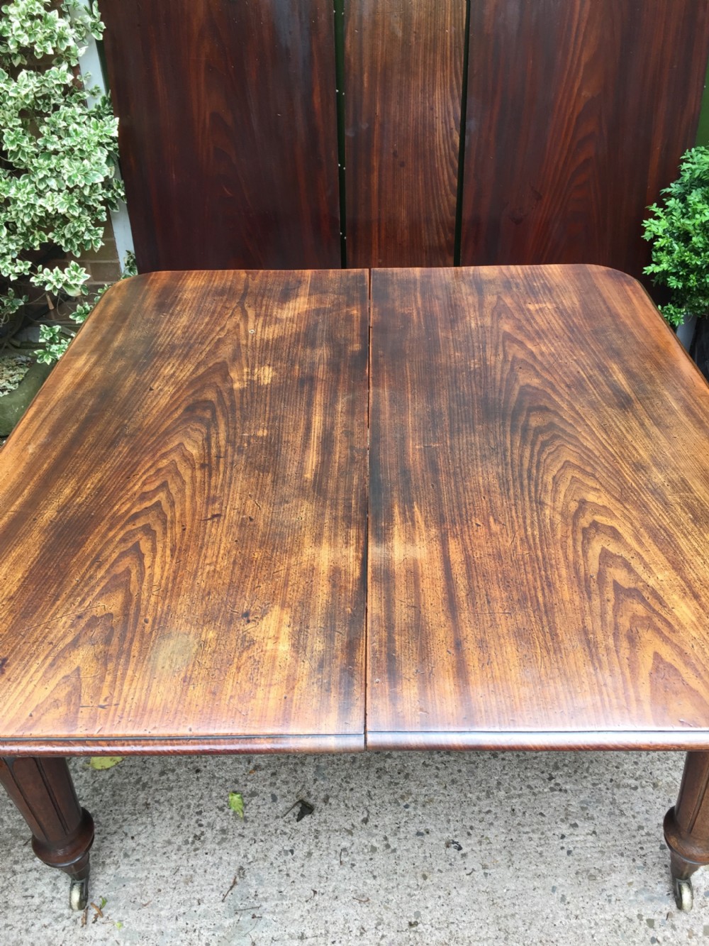 Early C19th Regency period mahogany extending dining table with 3 original additional leaves . View XXVI