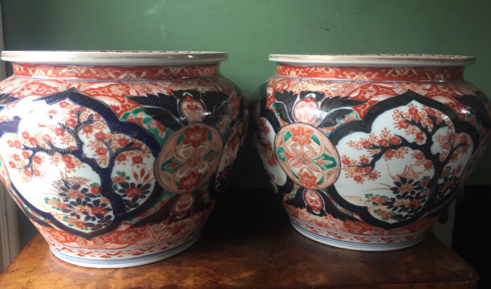 Decorative pair of late C19th Japanese Imari pattern porcelain jardinieres. View II