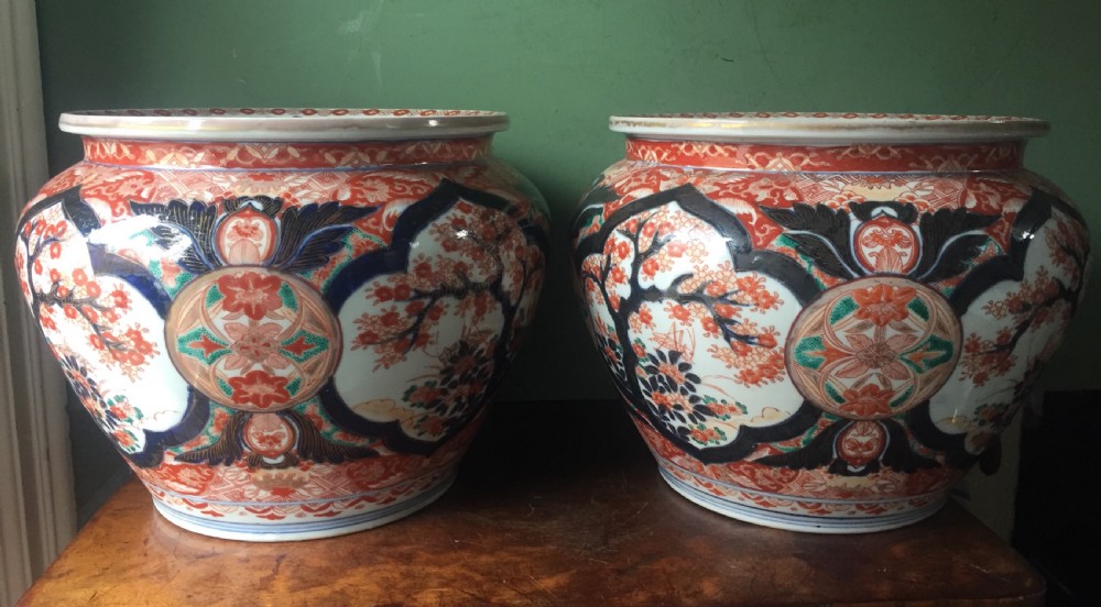 Decorative pair of late C19th Japanese Imari pattern porcelain jardinieres. View III