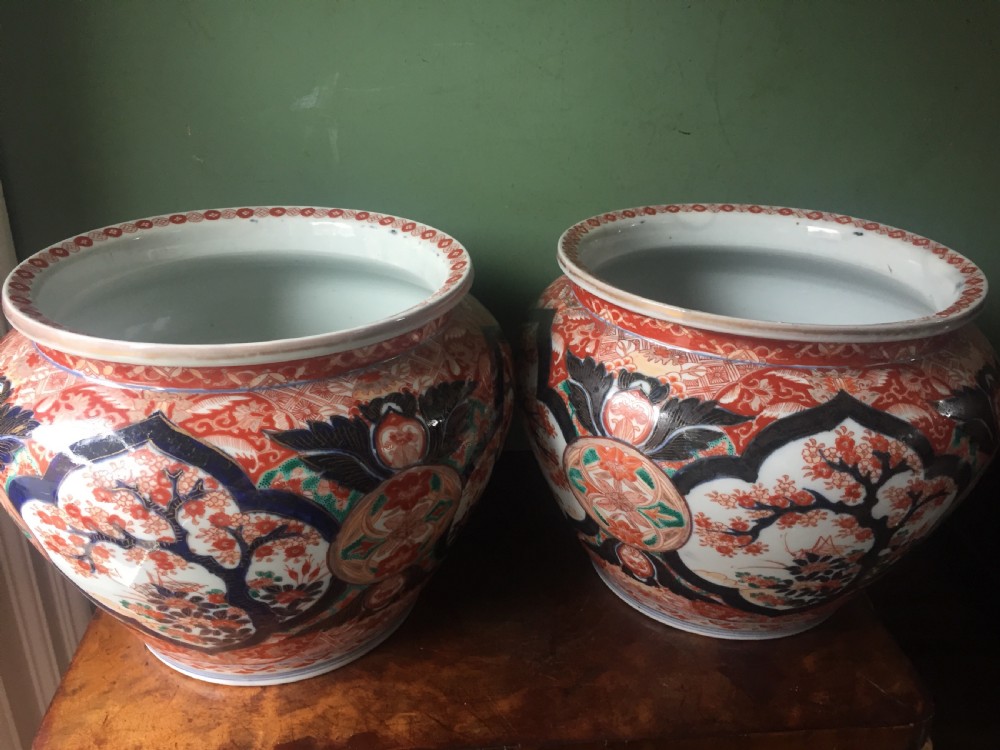 Decorative pair of late C19th Japanese Imari pattern porcelain jardinieres. View V