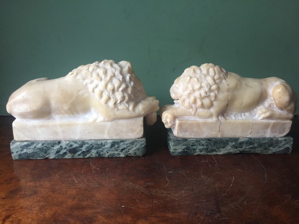 Pair of C19th Italian carved alabaster 'Grand Tour' souvenir lions after Antonio Canova . View IV